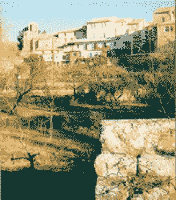 Caseres. The puig de les Gesseres and the river Algar.